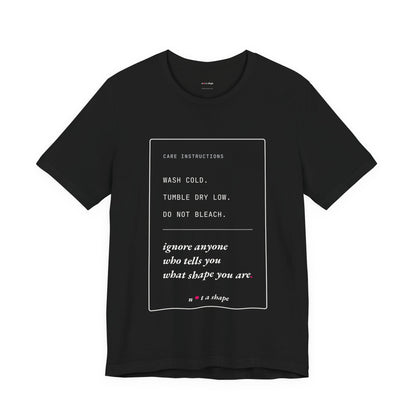 black t-shirt with a care label style graphic